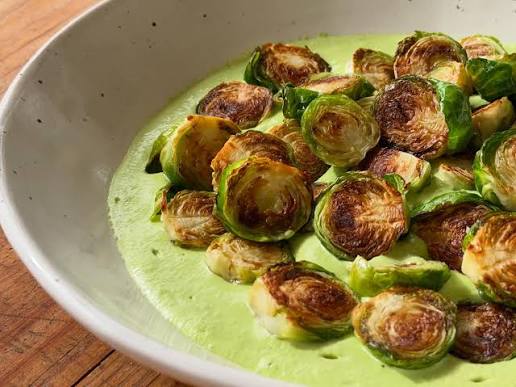 Osteria Mozza signature dishes 36-Month White Cow Modenese Parmigiano Reggiano
Shaved Brussels Sprouts
Orecchiette